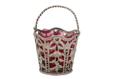 Lot 480 - A GEORGE III SILVER OPEN SWING HANDLED BASKET,...