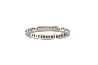 Lot 43 - A DIAMOND ETERNITY RING, mounted in white gold....