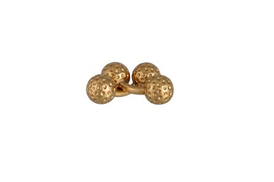 Lot 110 - A PAIR OF HERMÈS GOLF BALL CUFFLINKS, mounted...