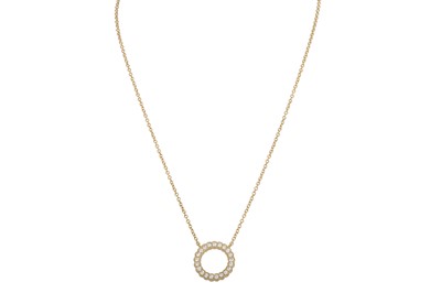 Lot 187 - A DIAMOND SET PENDANT, of circular form,...