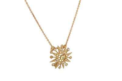 Lot 206 - AN ANTIQUE 15CT GOLD CITRINE & SEED PEARL STAR...