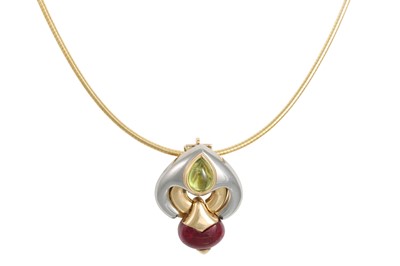 Lot 296 - A PERIDOT AND TOURMALINE PENDANT, of shaped...