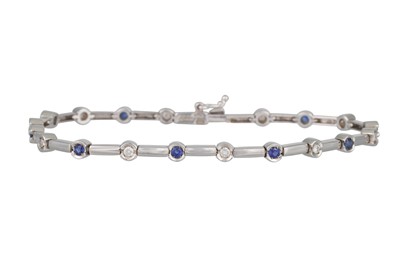 Lot 124 - AN ITALIAN SAPPHIRE AND DIAMOND LINE BRACELET,...
