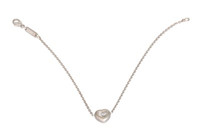 Lot 34 - A CHOPARD “HAPPY DIAMONDS” BRACELET, set with...