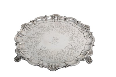 Lot 599 - A VICTORIAN SHAPED CIRCULAR SILVER SALVER,...