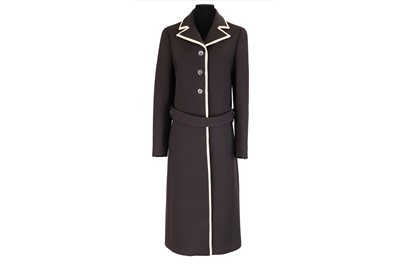 Lot 207 - A TAILORED PRADA COAT AND MATCHING SKIRT, made...