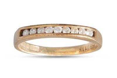 Lot 322 - A DIAMOND HALF ETERNITY RING, channel set with...