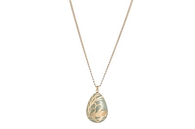 Lot 154 - A  JADE PENDANT, mounted in 18ct gold, on a...