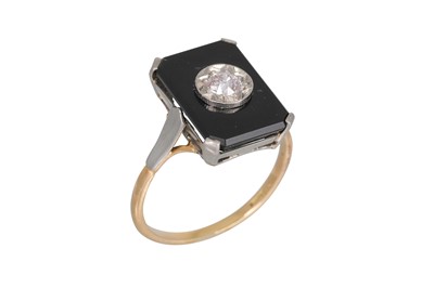 Lot 127 - AN ART DECO DIAMOND AND BLACK ONYX RING, of...