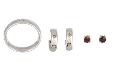 Lot 204 - A PAIR OF GARNET STUD EARRINGS, mounted in...