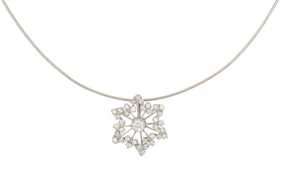 Lot 251 - A DIAMOND SNOWFLAKE CLUSTER PENDANT, mounted...
