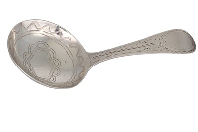 Lot 505 - A GEORGIAN NEOCLASSICAL SILVER CADDY SPOON,...