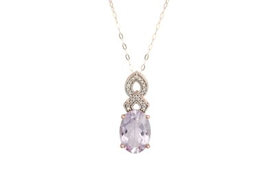 Lot 55 - AN AMETHYST AND DIAMOND PENDANT, the amethyst...