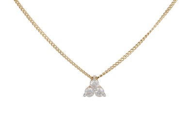 Lot 59 - A DIAMOND SET PENDANT, the trio of brilliant...