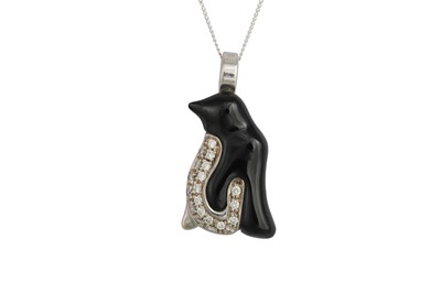 Lot 61 - A DIAMOND AND ONYX NOVELTY PENDANT, modelled...