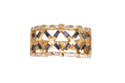 Lot 71 - A DIAMOND AND SAPPHIRE OPEN WORK RING, mounted...