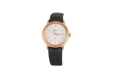 Lot 425 - A GENT'S STAINLESS STEEL GOLD PLATED RAYMOND...