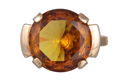 Lot 261 - A CHRYSOBERYL RING, the circular stone mounted...