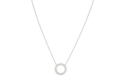 Lot 236 - A DIAMOND SET CIRCULAR PENDANT, the brilliant...