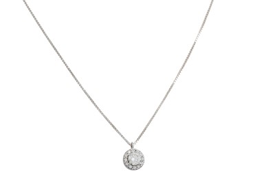 Lot 237 - A DIAMOND CLUSTER PENDANT, the brilliant cut...