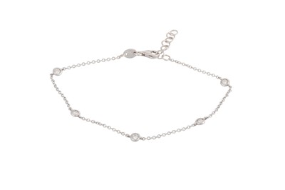 Lot 241 - A DIAMOND SET BRACELET, the brilliant cut...