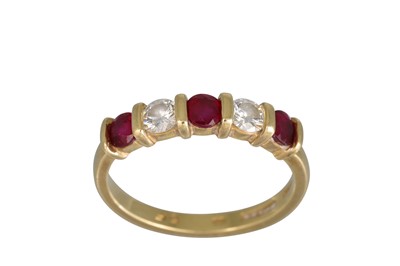 Lot 263 - A RUBY AND DIAMOND FIVE STONE RING, mounted in...