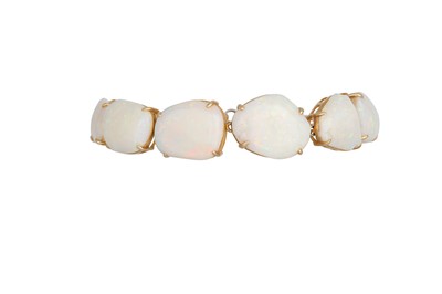 Lot 290 - A SIX STONE OPAL BRACELET, the cabochon stones...