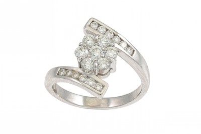 Lot 159 - A DIAMOND CLUSTER RING, twist design, the...