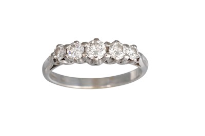 Lot 132 - A FIVE STONE DIAMOND RING, the brilliant cut...