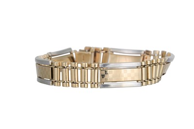 Lot 135 - A GENT'S TWO TONE BRACELET, in 14ct gold,...