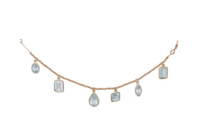 Lot 323 - AN AQUAMARINE BRACELET, the 18ct yellow gold...
