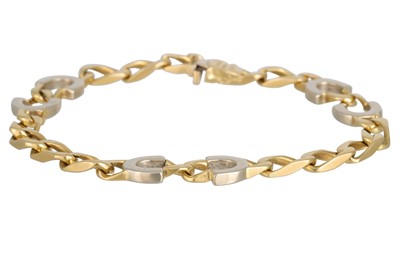 Lot 324 - A GOLD BRACELET, in 18ct white and yellow gold,...