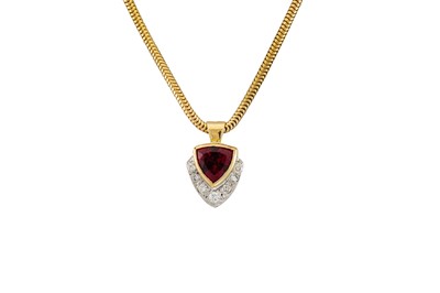 Lot 168 - A TOURMALINE AND DIAMOND PENDANT, the trillion...