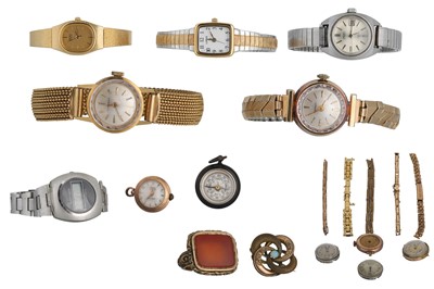 Lot 424 - TWO LADY'S GOLD WATCH HEADS, a bubble watch...