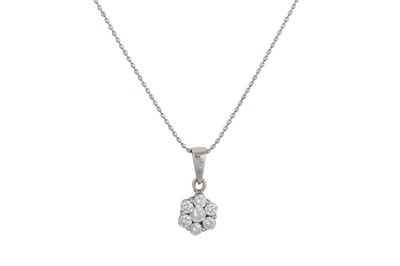 Lot 345 - A DIAMOND CLUSTER PENDANT, the brilliant cut...
