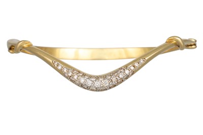 Lot 282 - A SHAPED DIAMOND BANGLE, pavé set in 18ct...