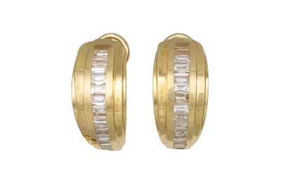 Lot 283 - A PAIR OF DIAMOND HOOP EARRINGS, the baguette...