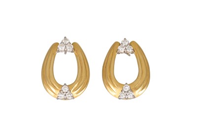 Lot 286 - A PAIR OF DIAMOND EARRINGS, each horseshoe...