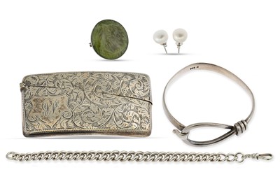 Lot 580 - AN ANTIQUE SILVER GRADUATED BRACELET, together...