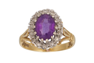 Lot 62 - AN AMETHYST AND DIAMOND CLUSTER RING, mounted...