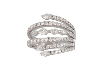 Lot 154 - A DIAMOND SET SIX ROWED CROSS OVER RING, set...