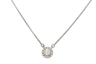 Lot 204 - A DIAMOND CLUSTER PENDANT, the brilliant cut...