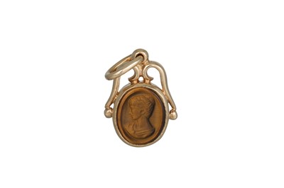 Lot 228 - A 9CT GOLD TIGERS EYE CAMEO PENDANT, Dublin...