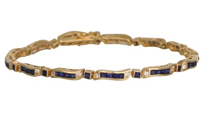 Lot 248 - A STONE SET LINE BRACELET, channel set in 18ct...