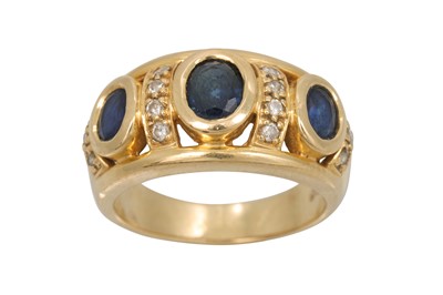 Lot 250 - A SAPPHIRE AND DIAMOND DRESS RING, three...