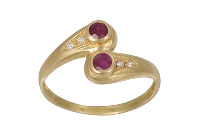 Lot 252 - A RUBY AND DIAMOND RING, of twist design...