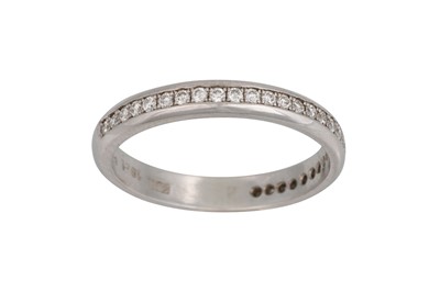 Lot 257 - A DIAMOND HALF ETERNITY RING, the brilliant...