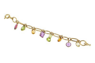 Lot 279 - A GEM SET CHARM BRACELET, the 18ct yellow gold...