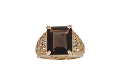 Lot 90 - A SMOKY QUARTZ SET DRESS RING, mounted in 10ct...