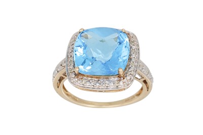 Lot 103 - A DIAMOND AND TOPAZ DRESS RING, the mixed cut...